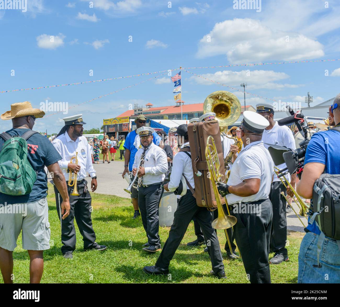 NEW ORLEANS, LA, USA APRIL 29, 2022 New Wave Brass Band organizing for performance on the New