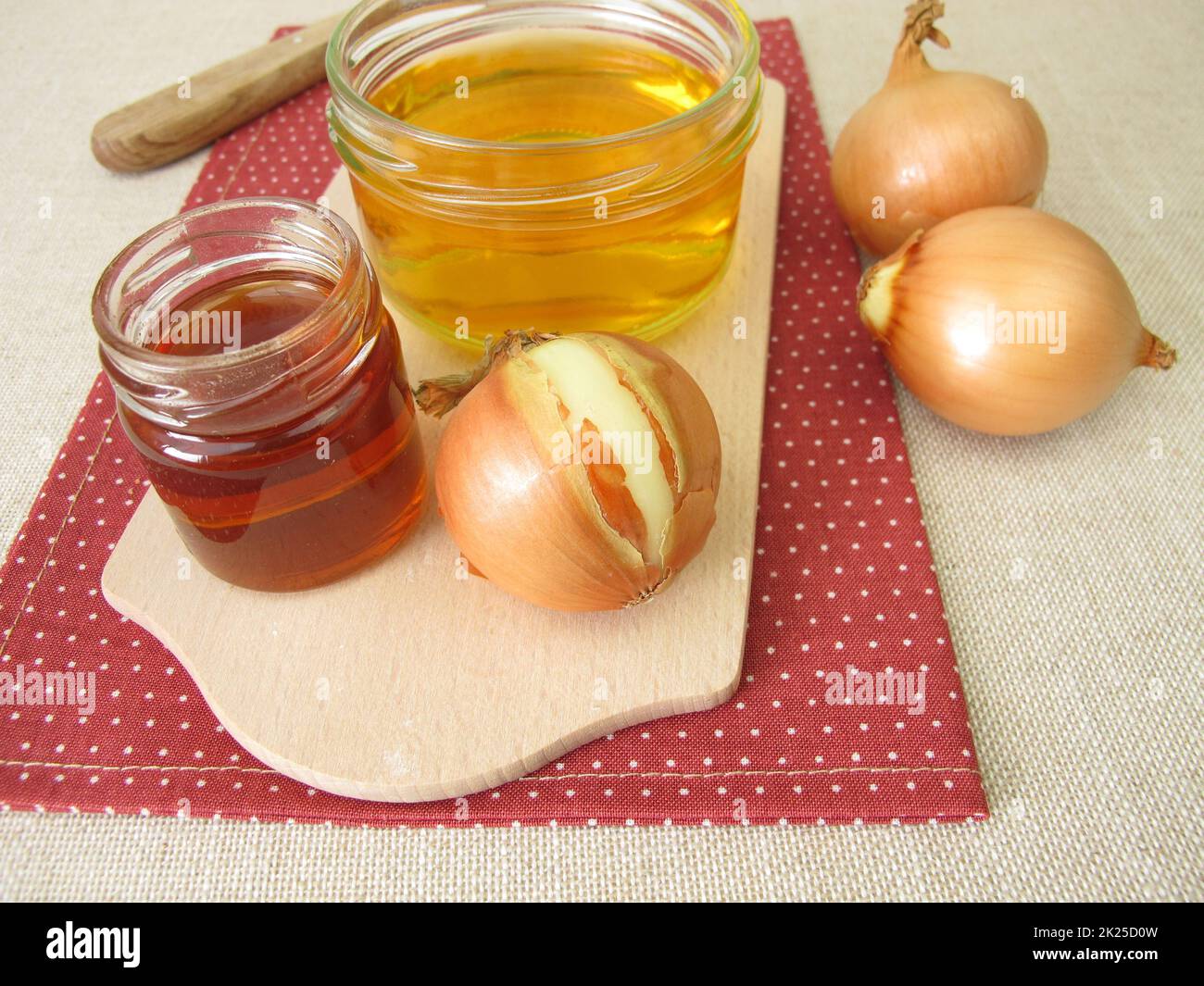 Fresh onion syrup, onion juice in a glass jar Stock Photo Alamy