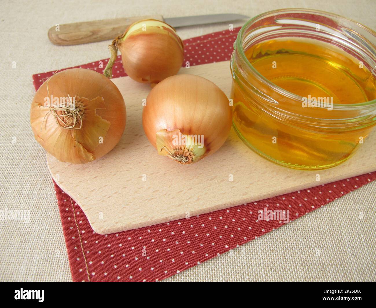 Fresh onion syrup, onion juice in a glass jar Stock Photo Alamy