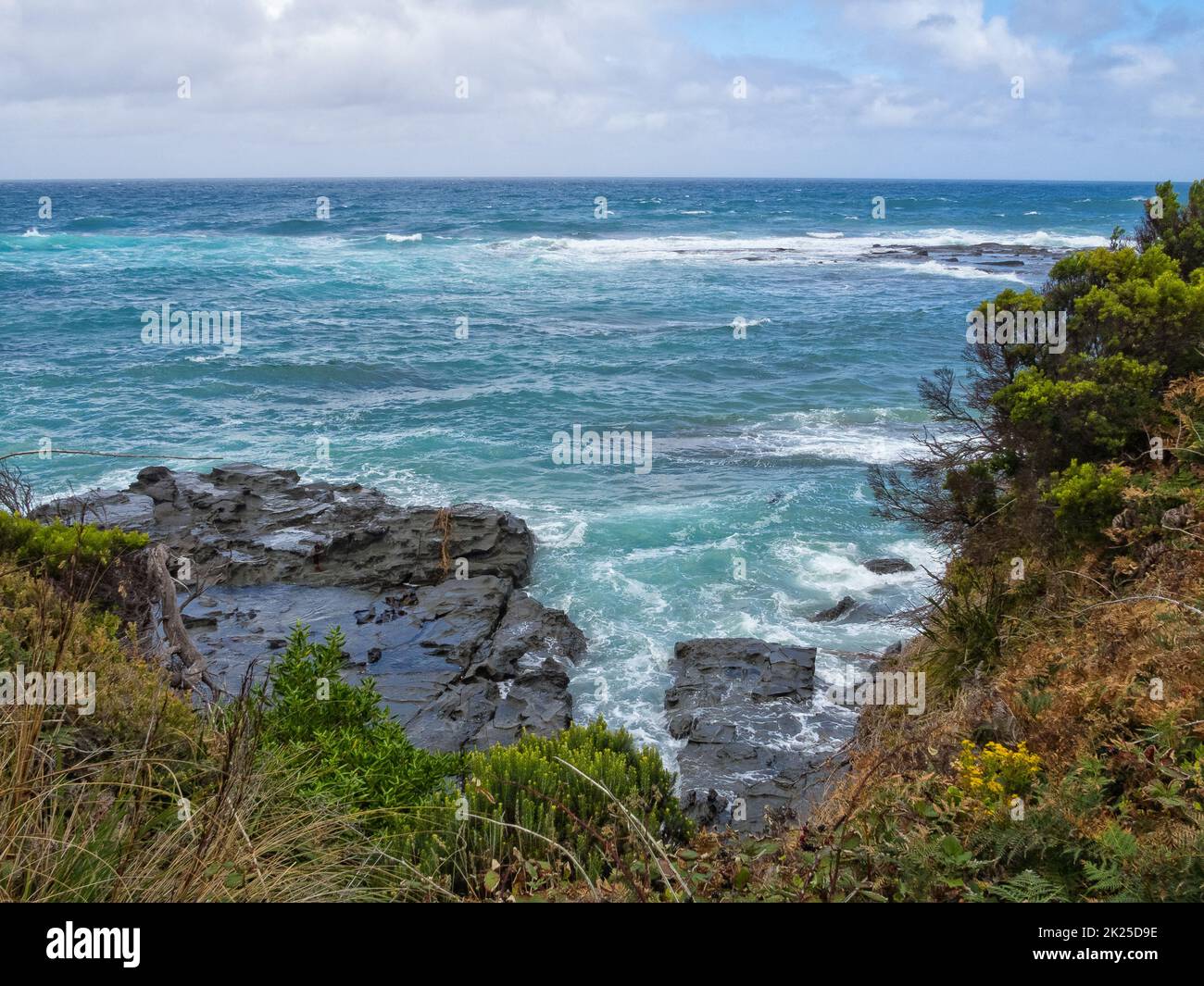 Waves and rocks - Marengo Stock Photo