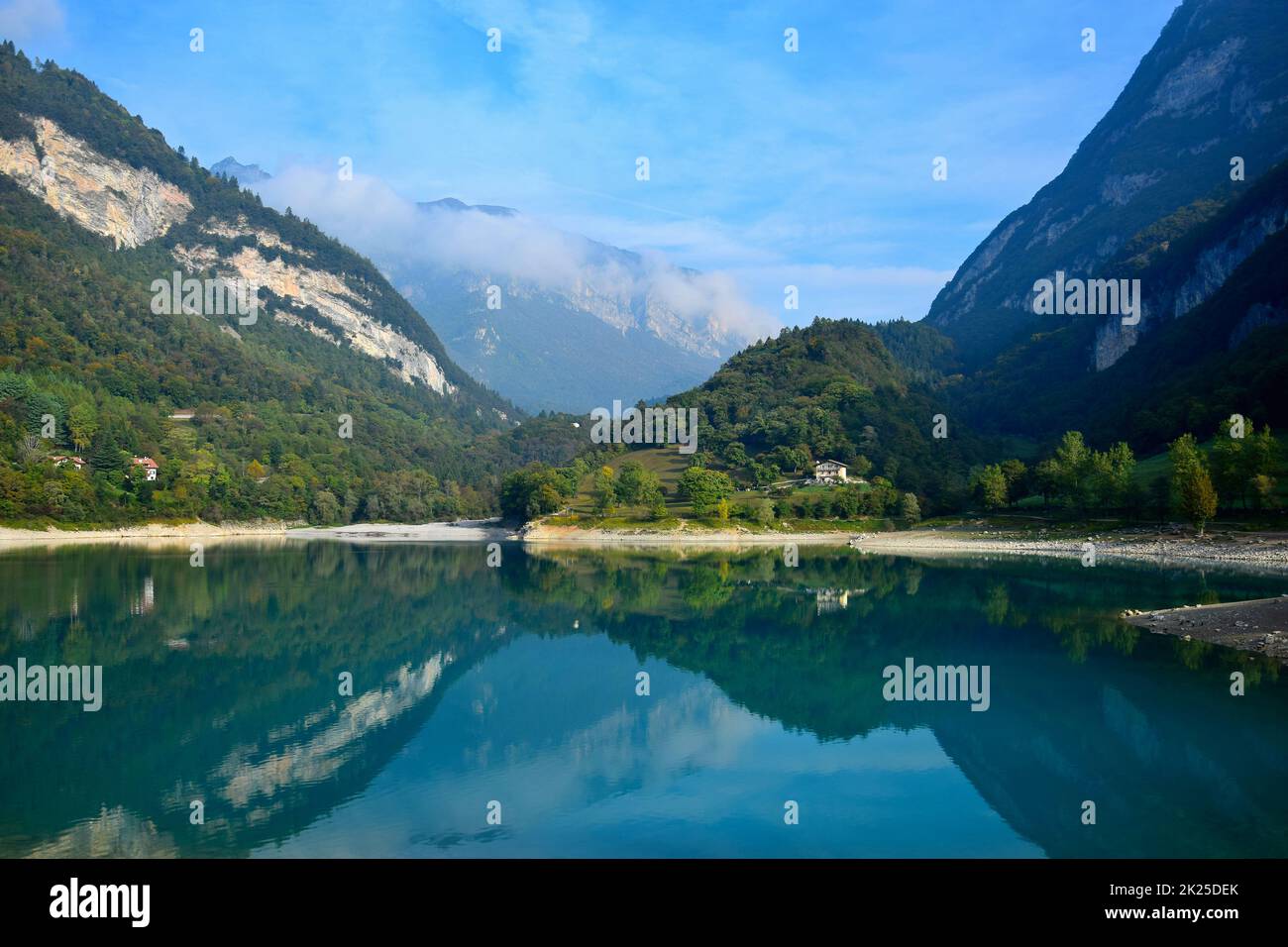 Lago di Tenno with its clear turquoise water in the morning light. Trentino, Italy. Stock Photo