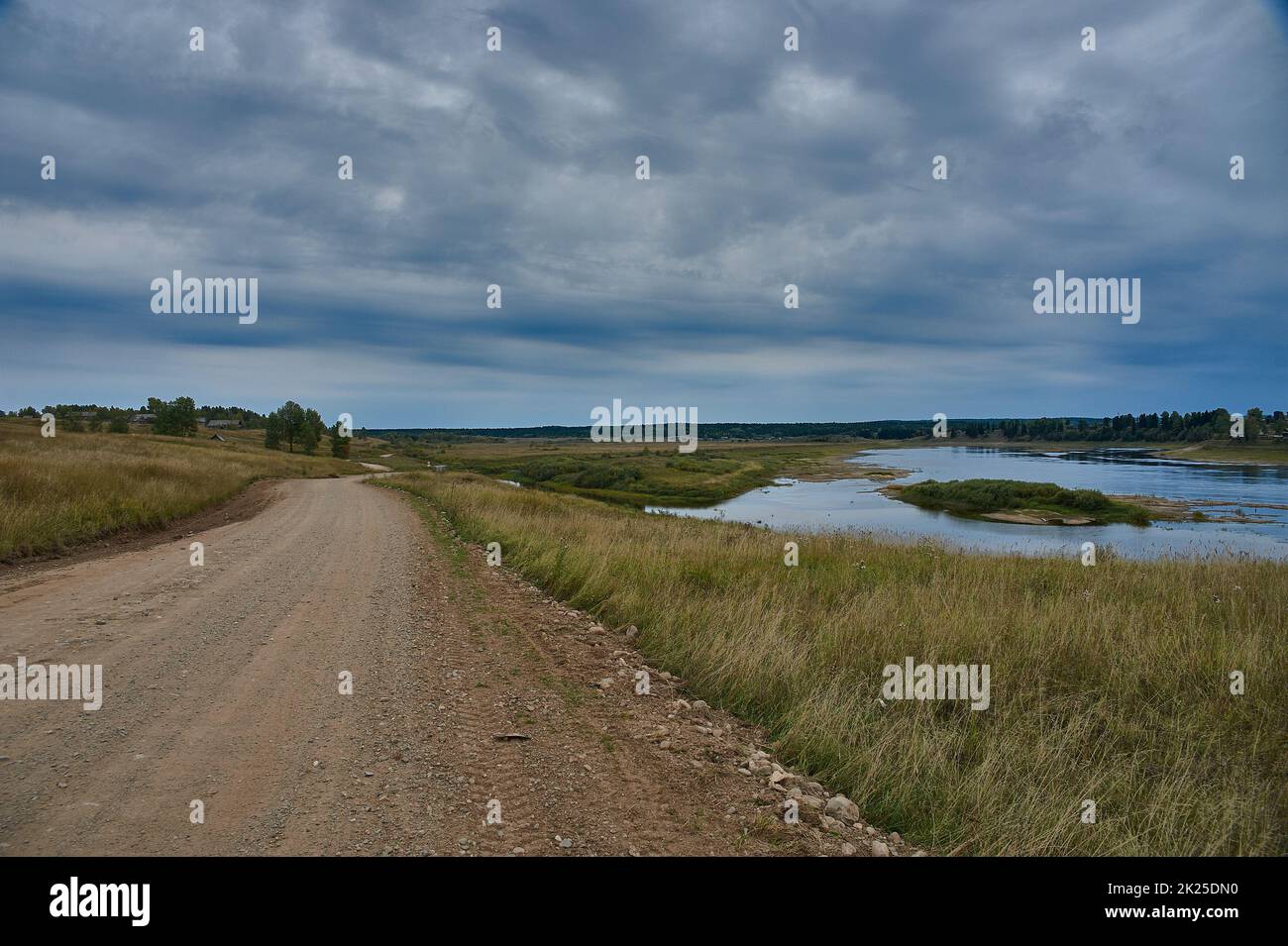 Forest dirt road in the wilderness along the river Stock Photo - Alamy