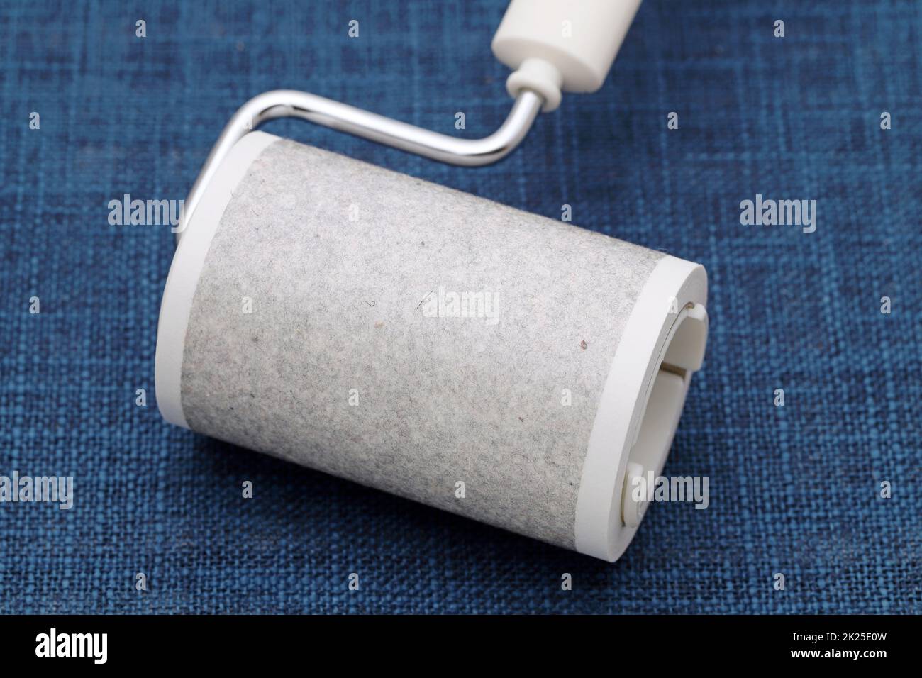 close up of used sticky roller cleaning, housework and housekeeping concept Stock Photo