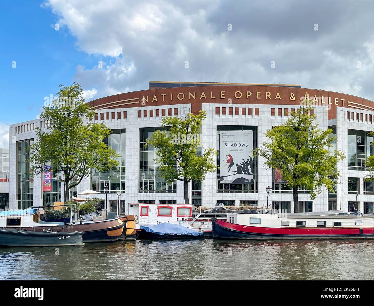 Amsterdam, Netherlands - August 2022: Glass topped tourist sightseeing canal boat cruising on one of the city's centre Stock Photo