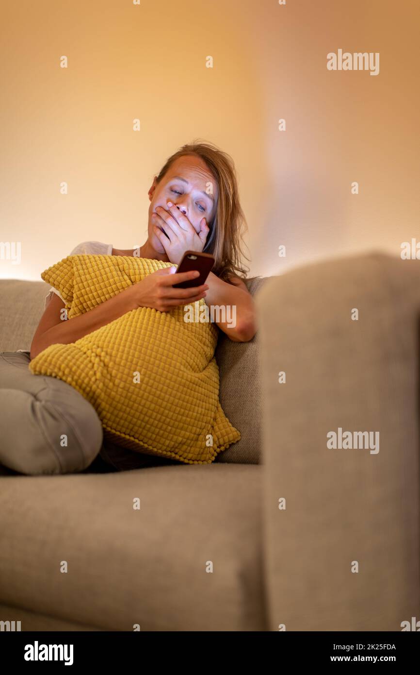 Getting comfy on sofa hires stock photography and images Alamy