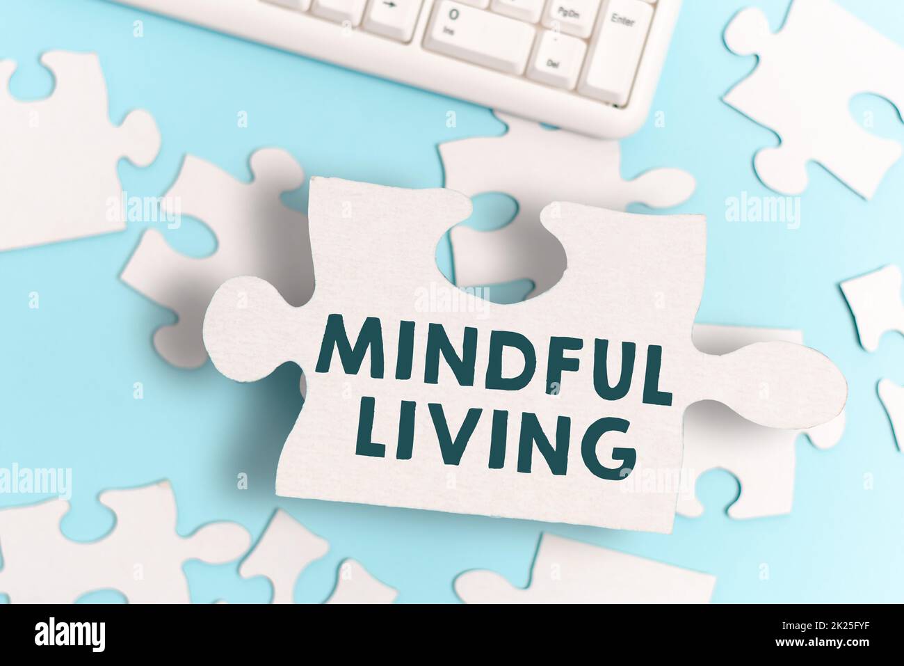Inspiration showing sign Mindful Living. Conceptual photo Fully aware and engaged on something Conscious and Sensible Building An Unfinished White Jigsaw Pattern Puzzle With Missing Last Piece Stock Photo