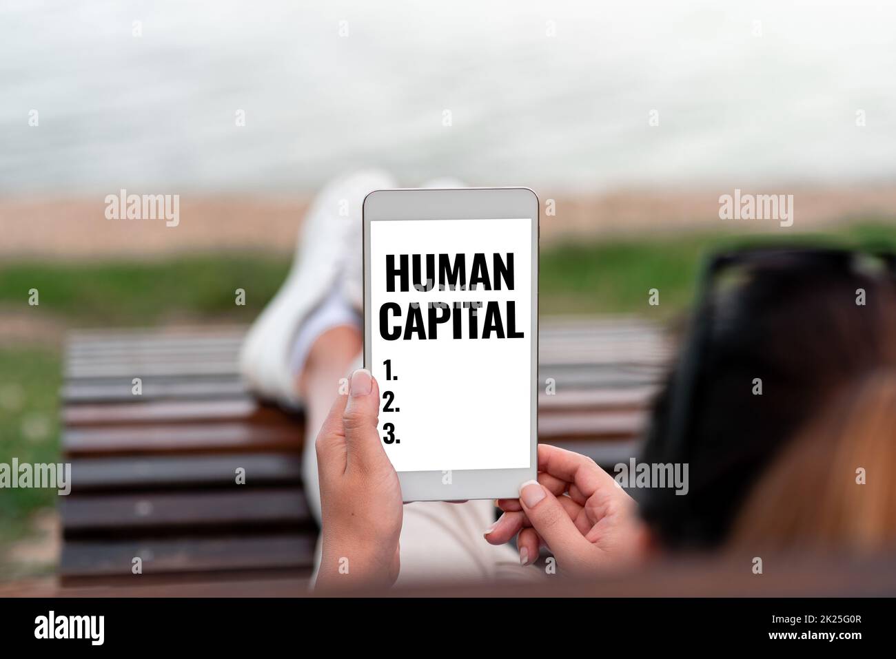 Text showing inspiration Human Capital. Business overview Intangible Collective Resources Competence Capital Education Voice And Video Calling Capabilities Connecting People Together Stock Photo