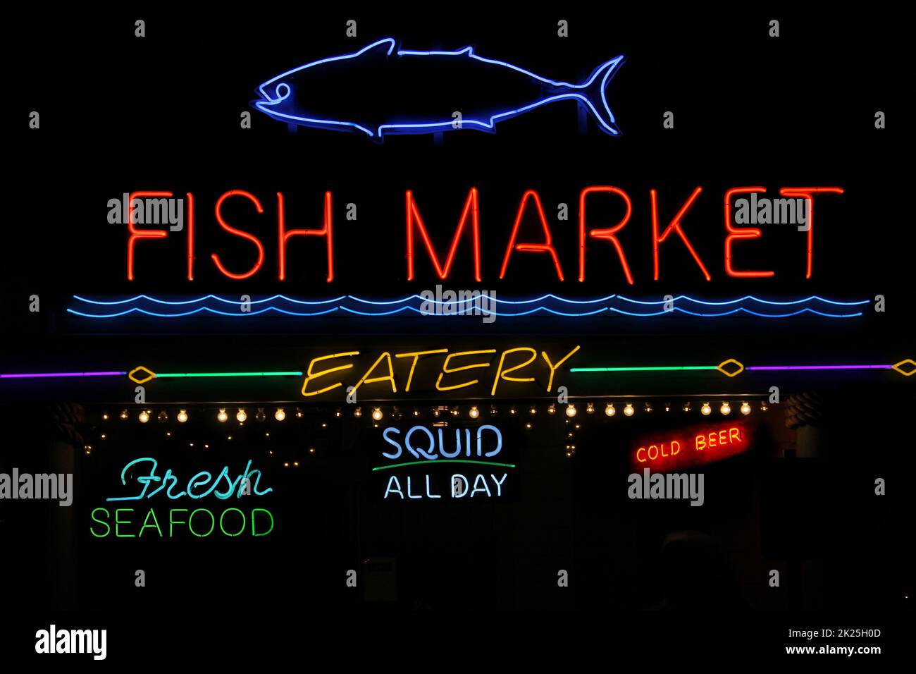 Vintage Neon Fish Market Sign Photo Composite Stock Photo