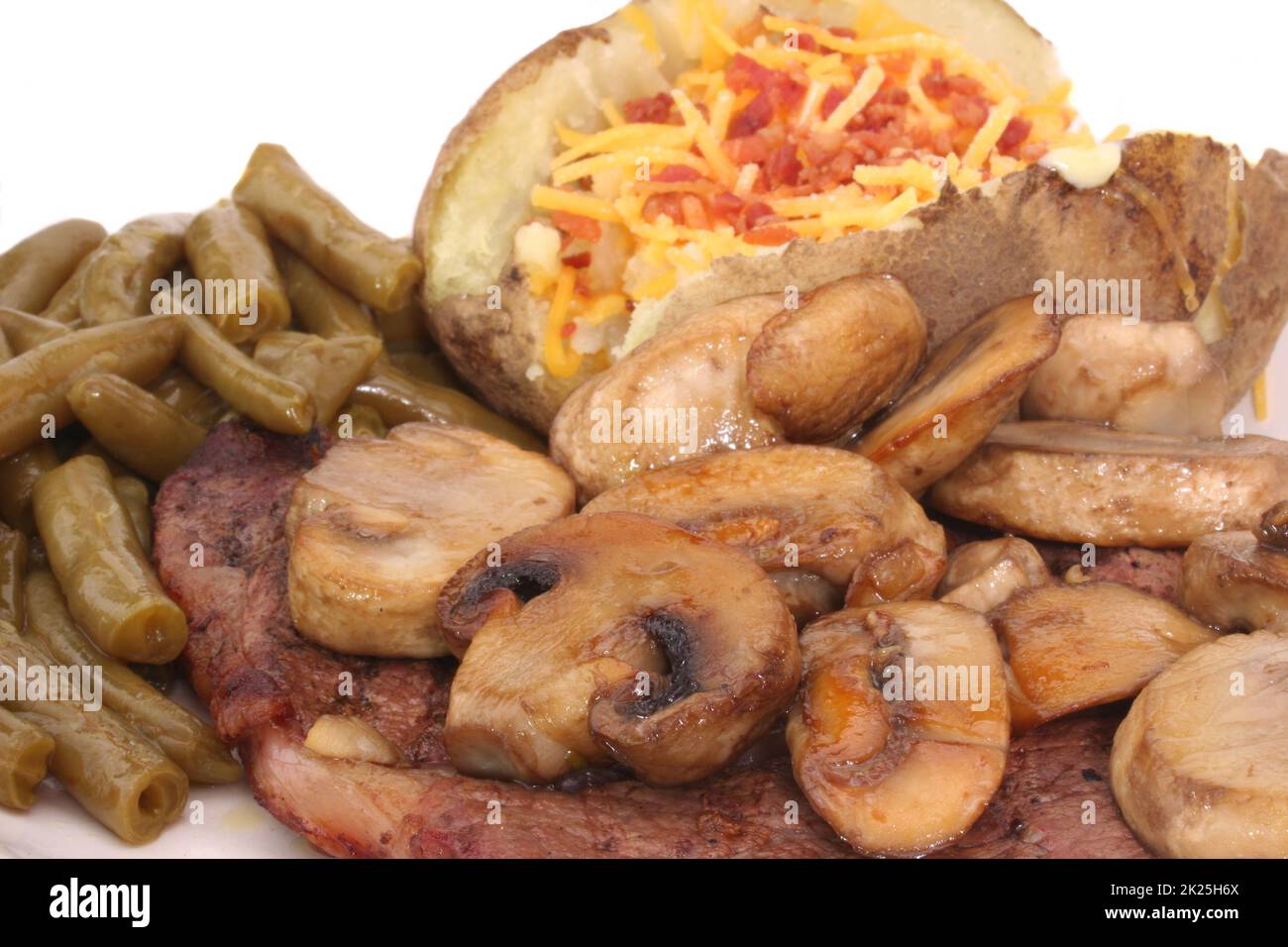Steak and Mushrooms With Green Beans and Potato Stock Photo