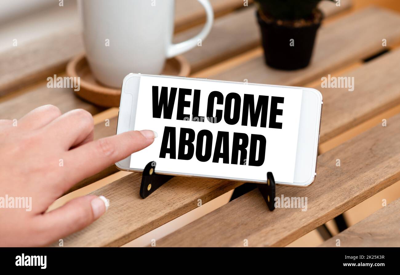 Conceptual caption Welcome Aboard. Business overview Expression of greetings to a person whose arrived is desired Voice And Video Calling Capabilities Connecting People Together Stock Photo