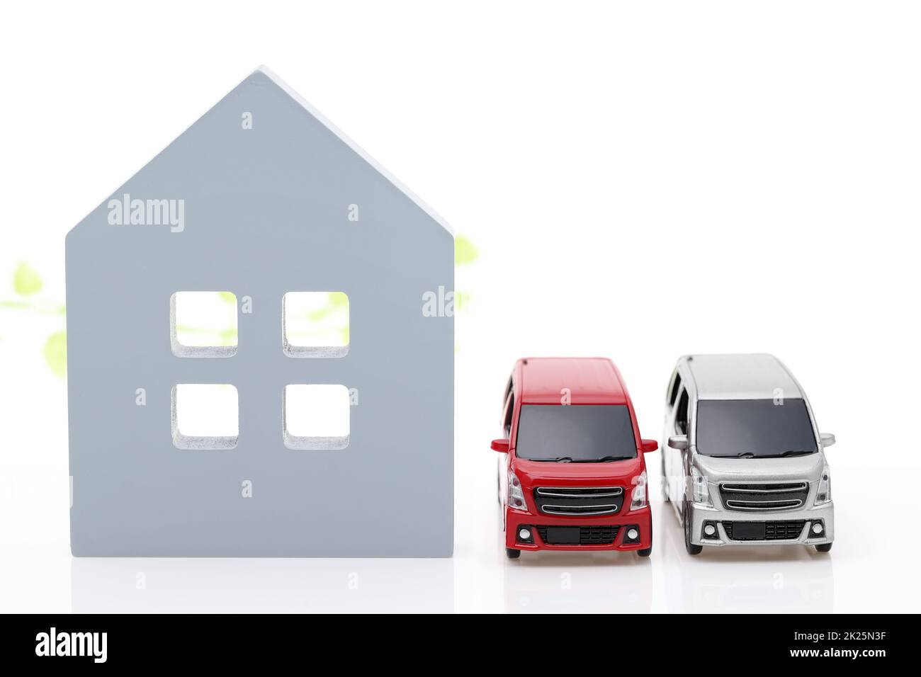 Wooden toy house and toy car isolated on white background Stock Photo ...
