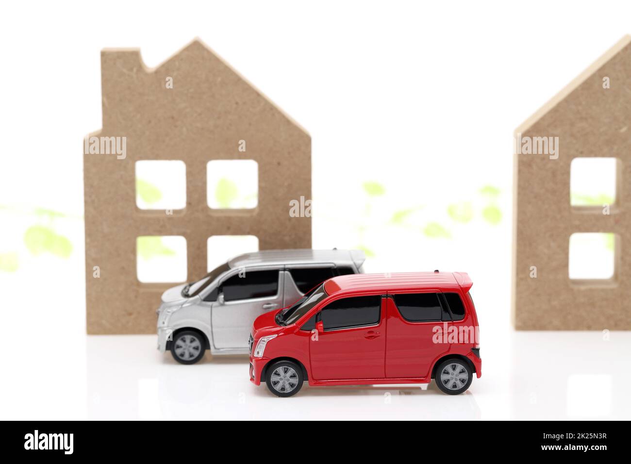 Wooden toy house and toy car isolated on white background Stock Photo ...