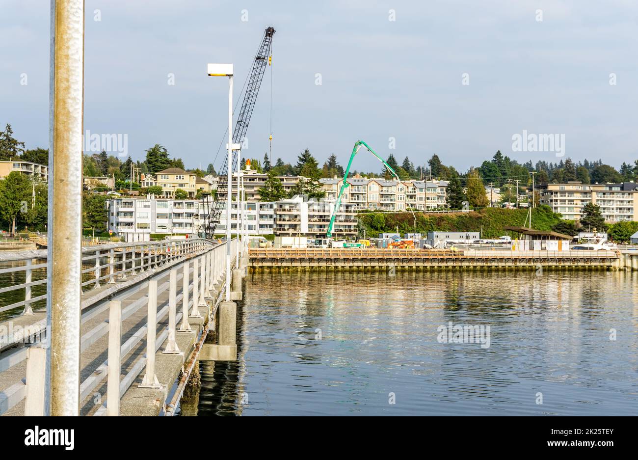 A crane at the Des Moines marina in Washington State shows that construction is happening. Stock Photo
