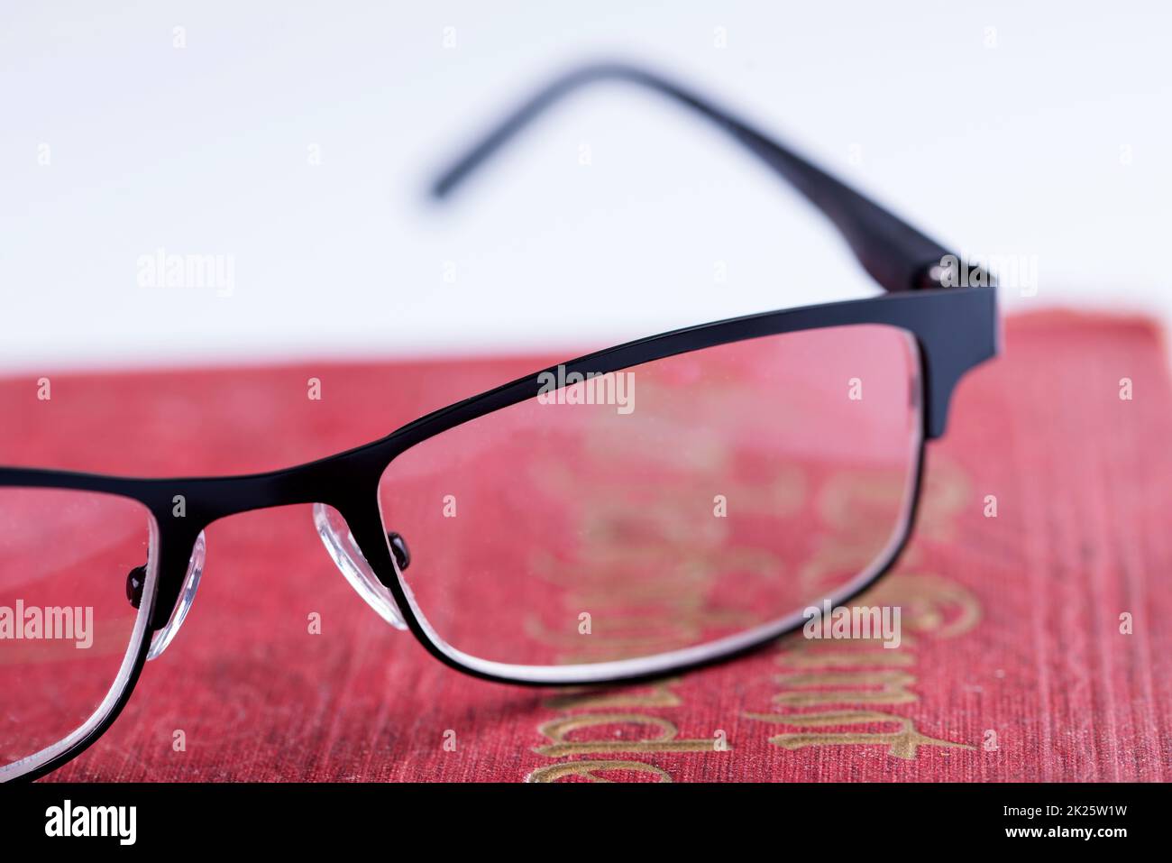 glasses on a old book Stock Photo