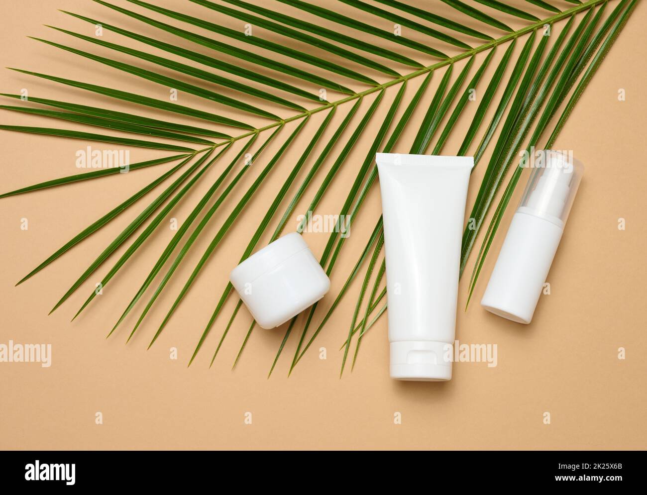 empty white plastic tube, bottle, jar for cosmetics. Packaging for