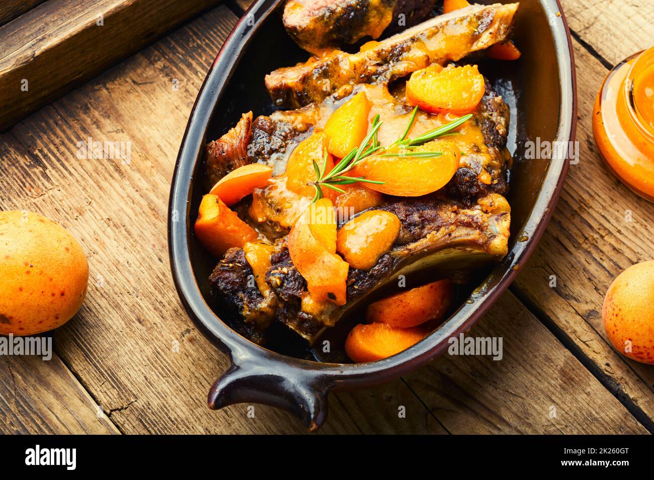 Fried beef ribs in fruit sauce. Stock Photo