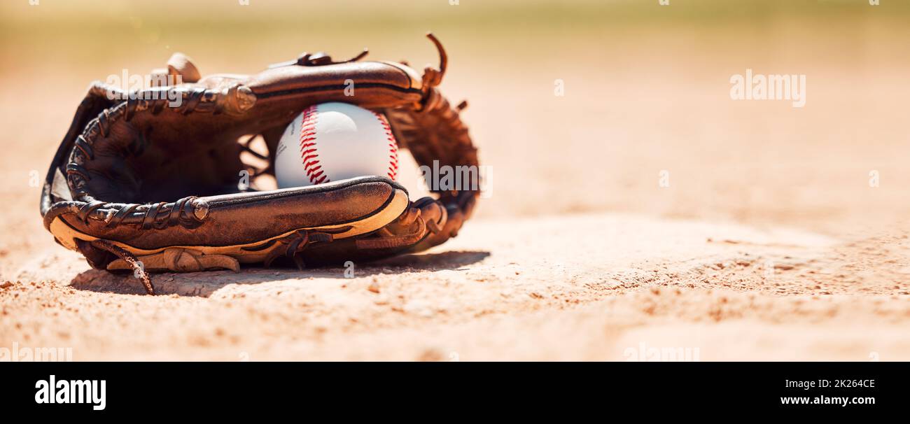 Baseball field, softball and ball, glove and base plate on pitch ground, field and turf outdoors for competition, game or match. Background for sports Stock Photo