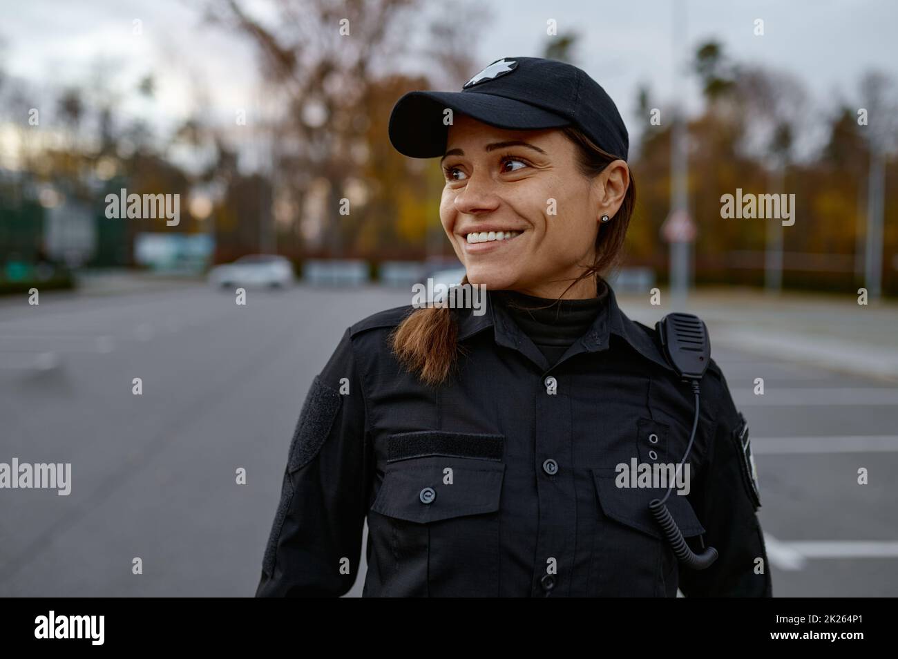 Woman police officer smiling hi-res stock photography and images - Alamy