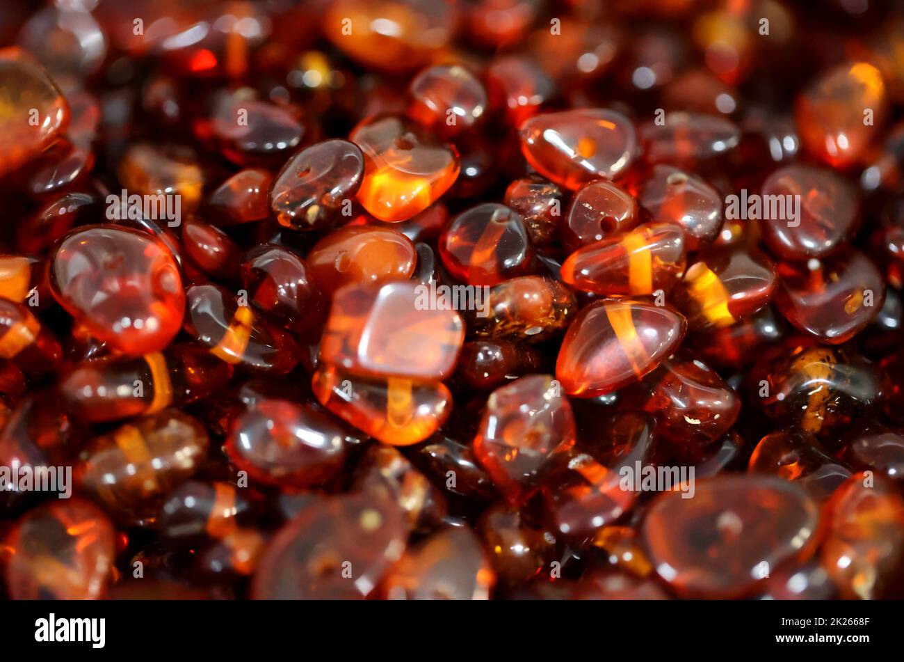 Amber in its natural form and warm color. Amber is often made into jewelry. Stock Photo