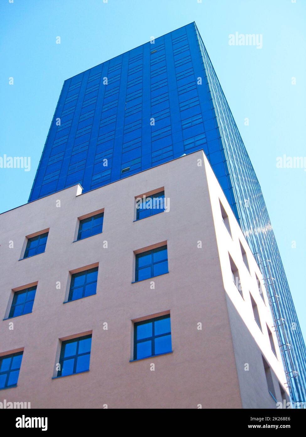High glass skyscraper in Warsaw. Modern architecture of city buildings Stock Photo