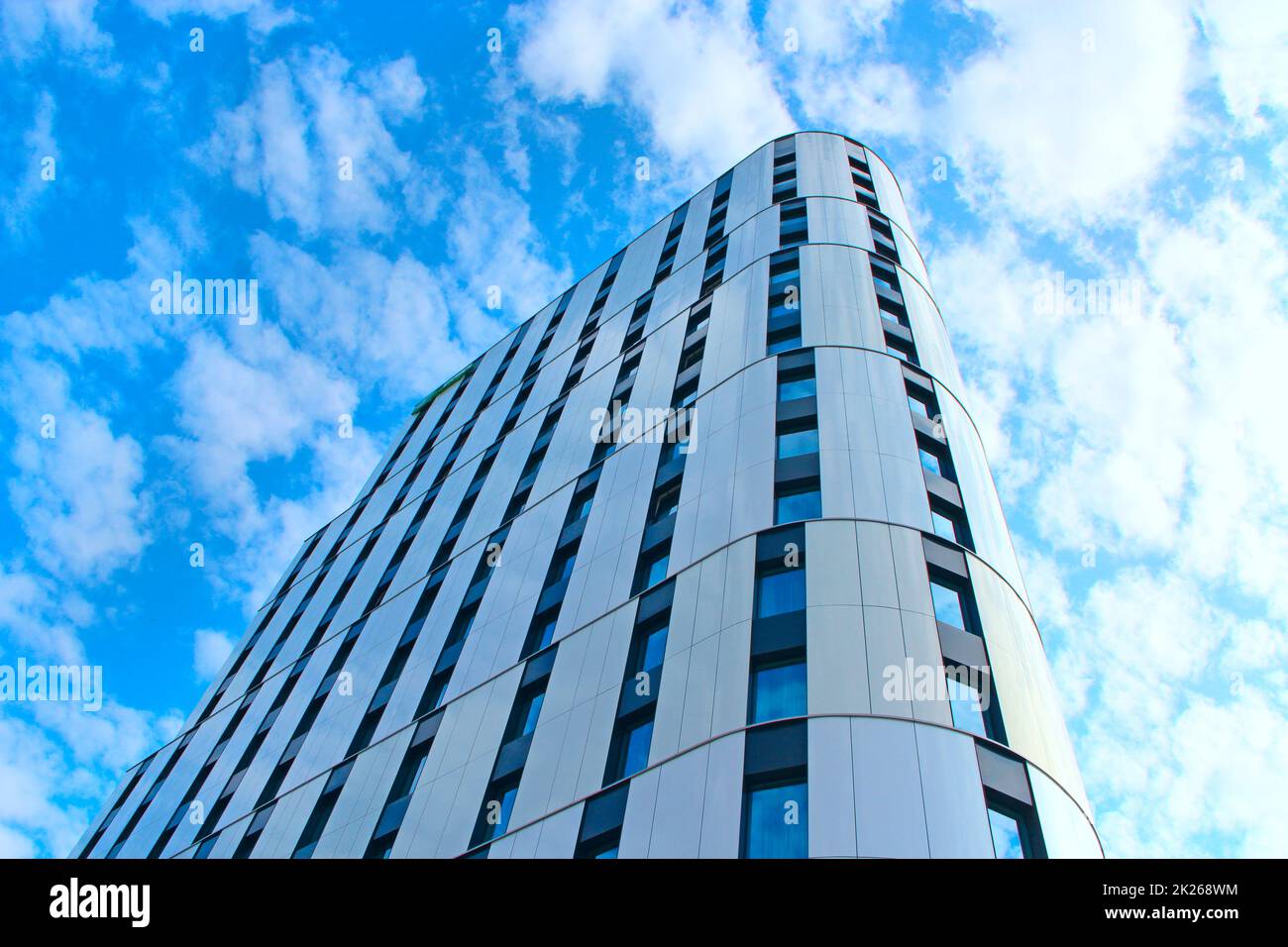High glass skyscraper in Warsaw. Modern architecture of city buildings Stock Photo