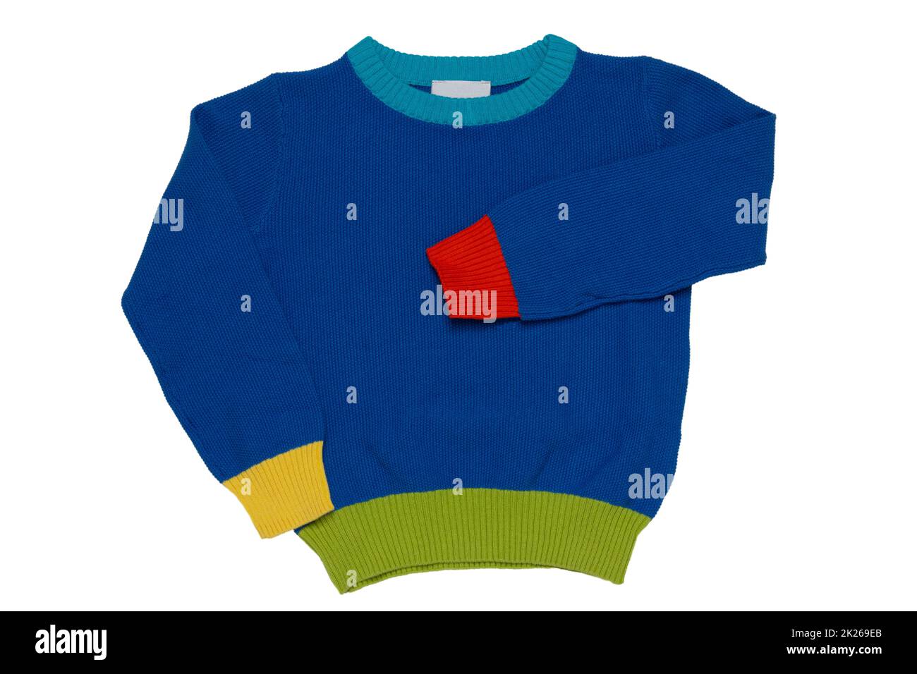 Top view of clothes for child boy isolated on a white background. A beautiful blue little child sweater or knitted cardigan. Autumn and winter fashion for kids. Stock Photo