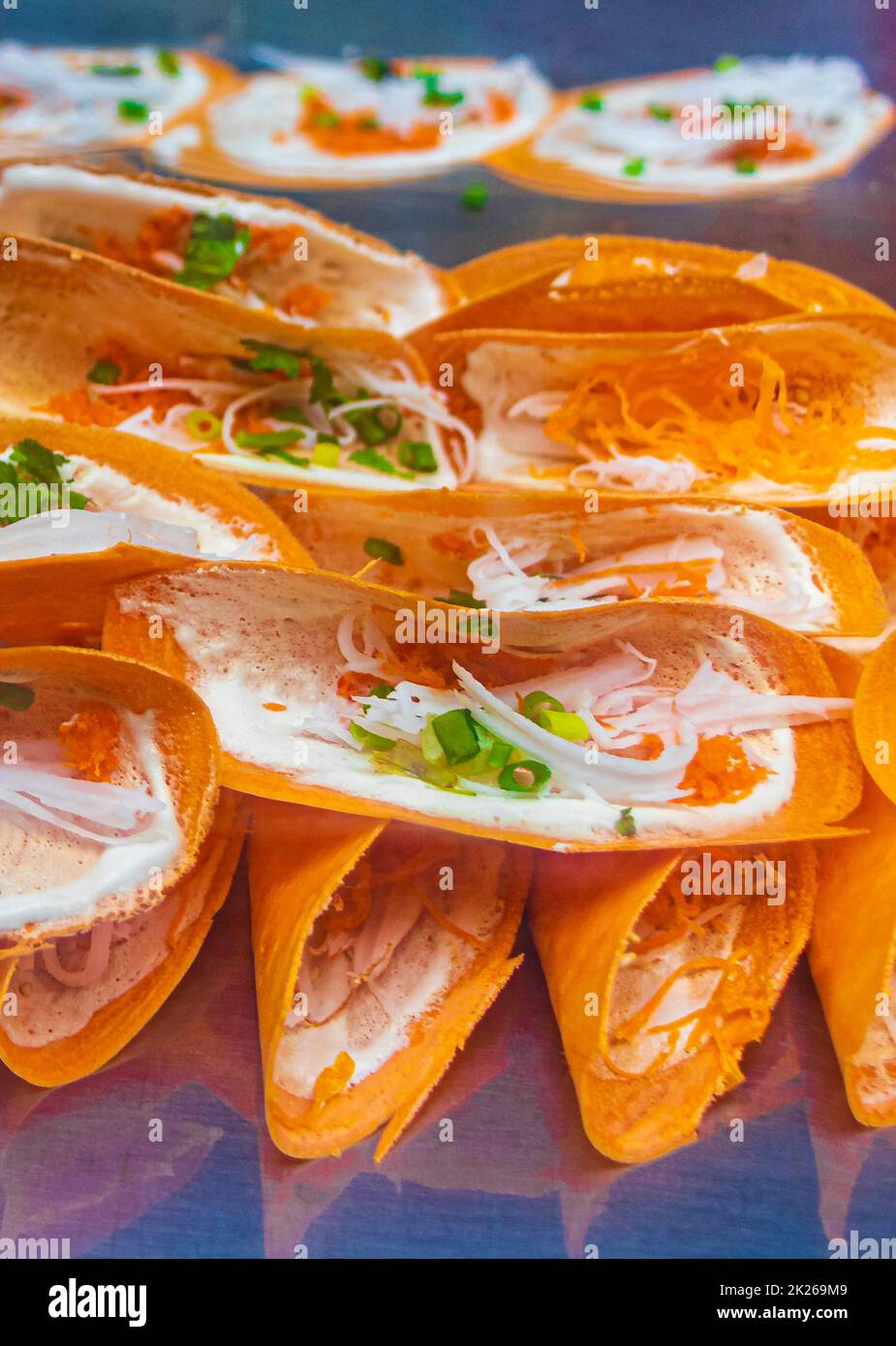 Thai pancake sweet China Town street food market Bangkok Thailand Stock