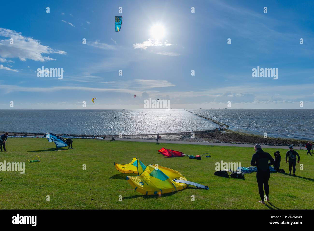 Kitesurfing on the North Sea at Nordstrand, North Frisia, Schleswig-Holstein, Northern Germany, Central Europe Stock Photo