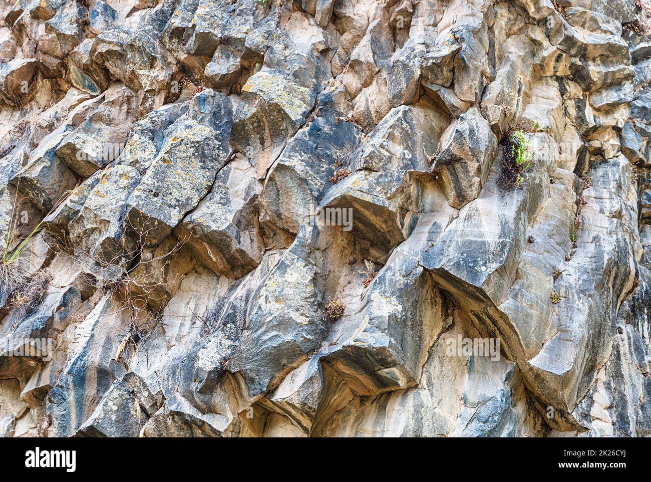 Texture of volcanic stones at the Alcantara Gorges, Sicily, Italy Stock Photo