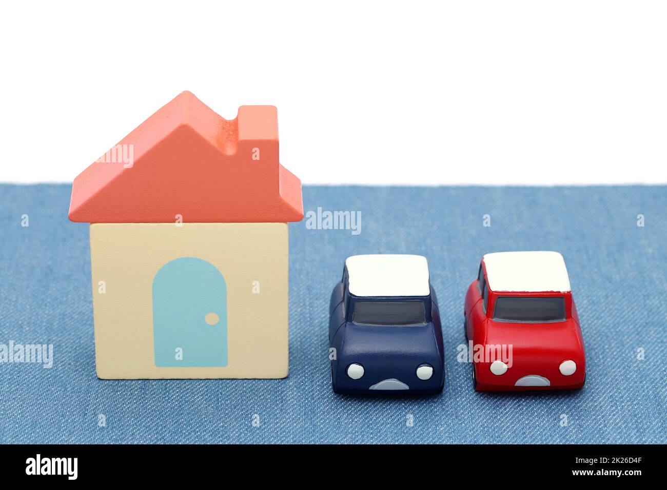 Wooden toy house and toy car isolated on white background Stock Photo ...
