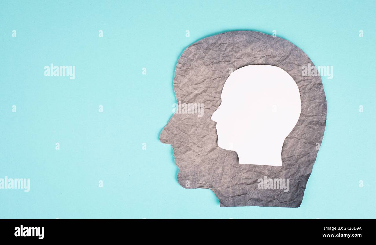 Silhouette of a head, the child inside of an adult, growing up, mindful, schizophrenia, psychology concept Stock Photo