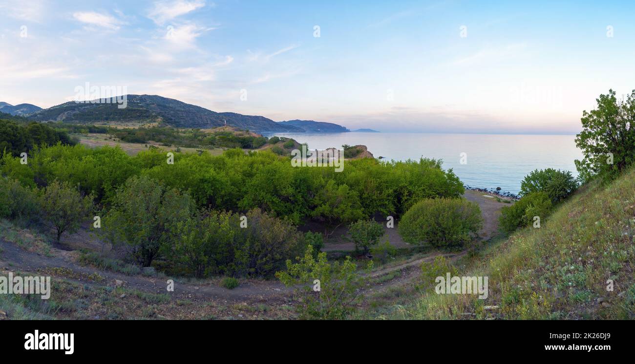 Maklura Garden at the foot of Choban-Kule on Cape Agira. Crimea.Panorama. Stock Photo