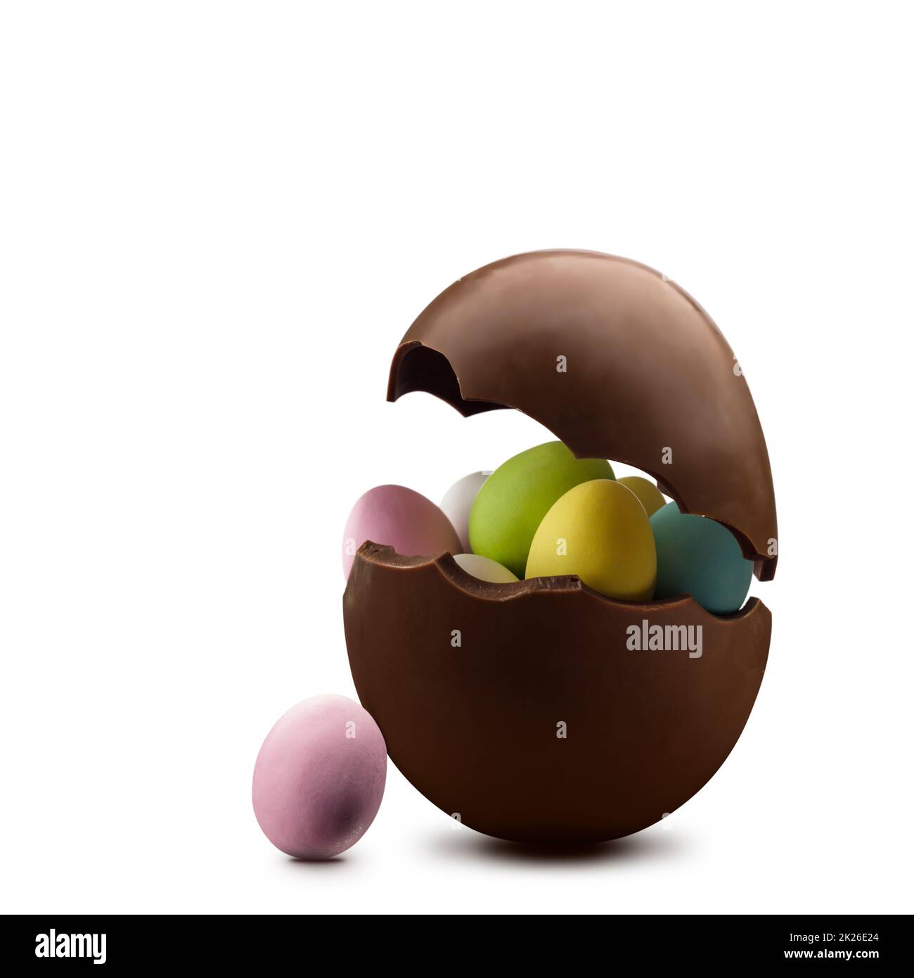 Chocolate easter egg with the top broken off Stock Photo - Alamy