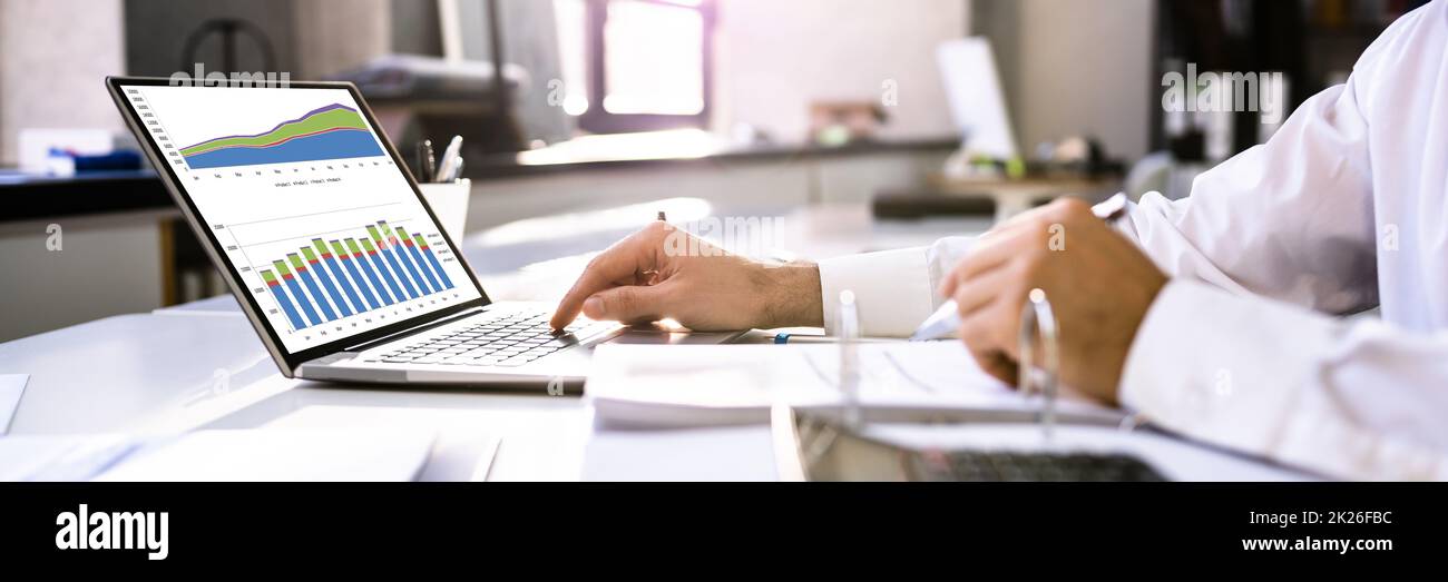 Business Advisor Using Financial Chart Stock Photo