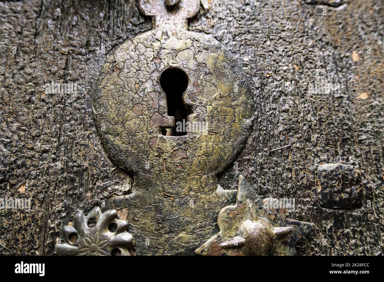 Detail of old lock on an abandoned and ruined door Stock Photo