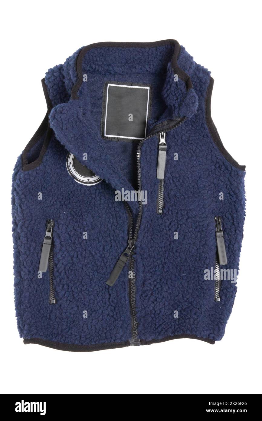Fur vest. A blue fur vest with blue wool lining fabric and zipper for the little boy isolated on a white background. Child spring and autumn fashion. Stock Photo