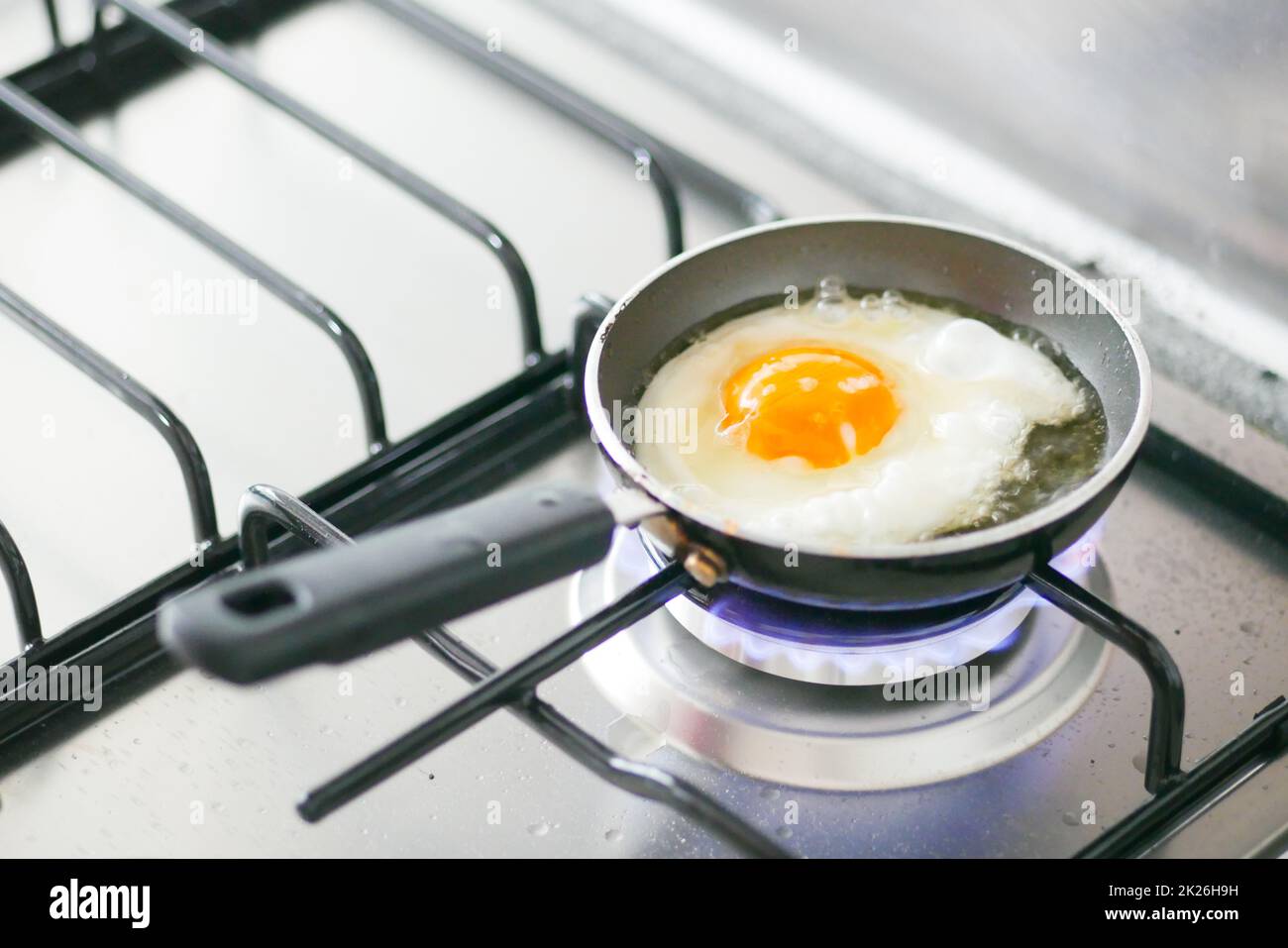 Fried eggs in the pan close up , Stock Photo