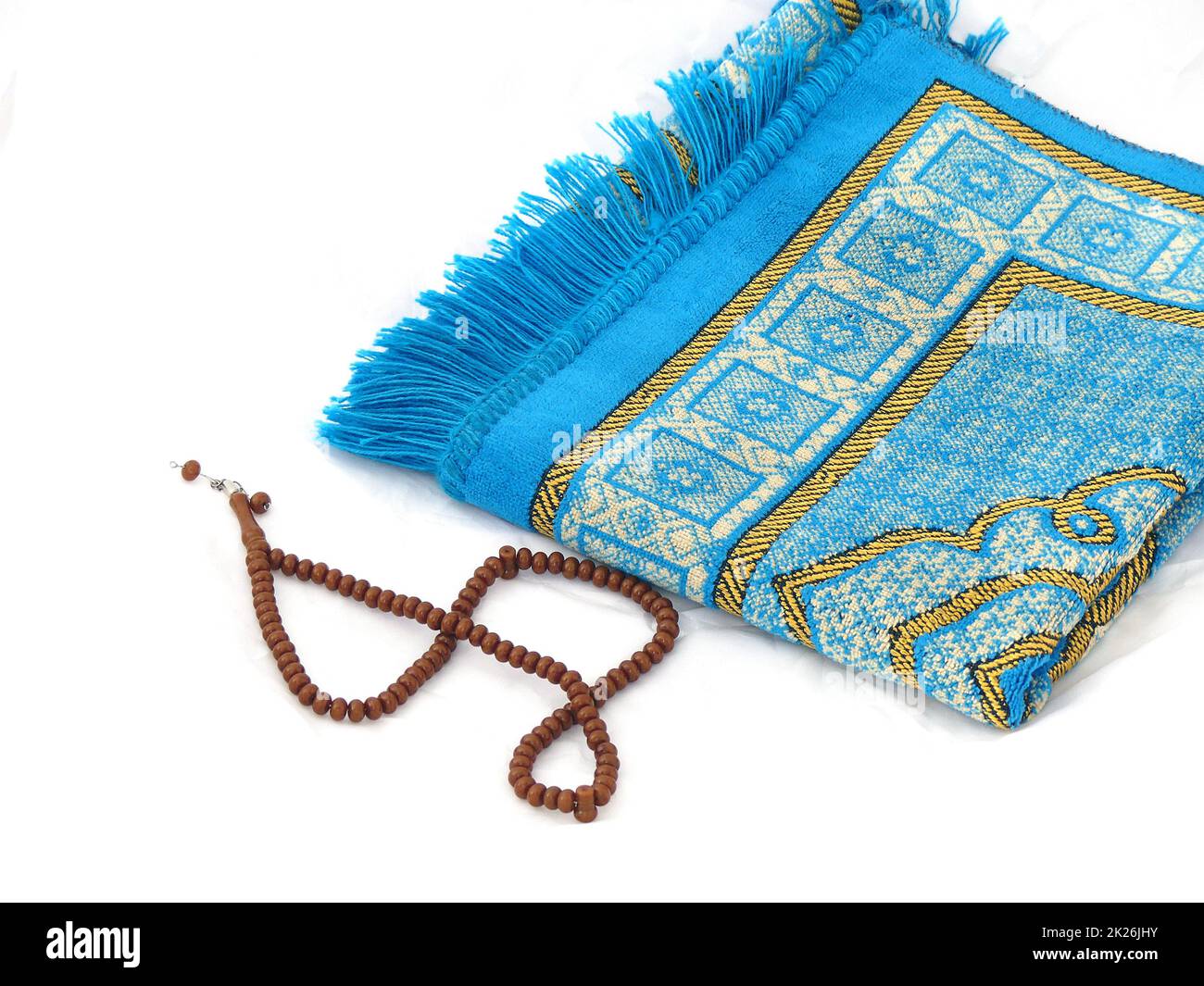 closeup prayer rug and rosary, Islam and prayer rug, on the