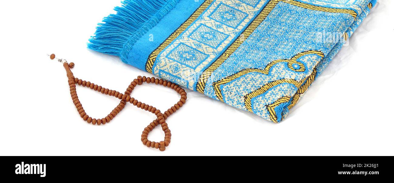 closeup prayer rug and rosary, Islam and prayer rug, on the