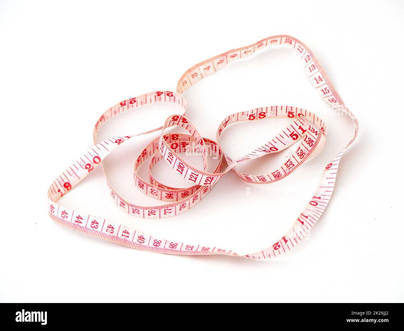 close-up tailor's tape measure,rope tape measure on a white background Stock Photo