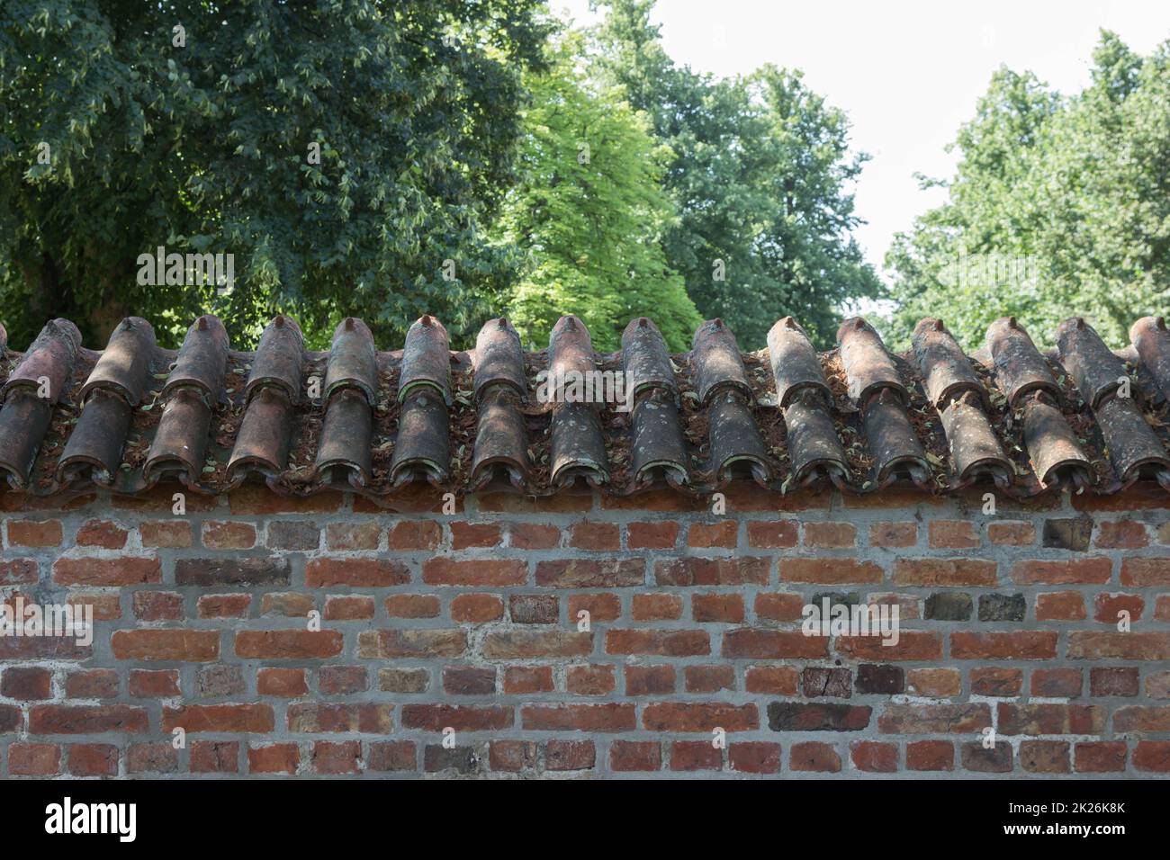 Old brick garden boundary wall hi-res stock photography and images - Alamy