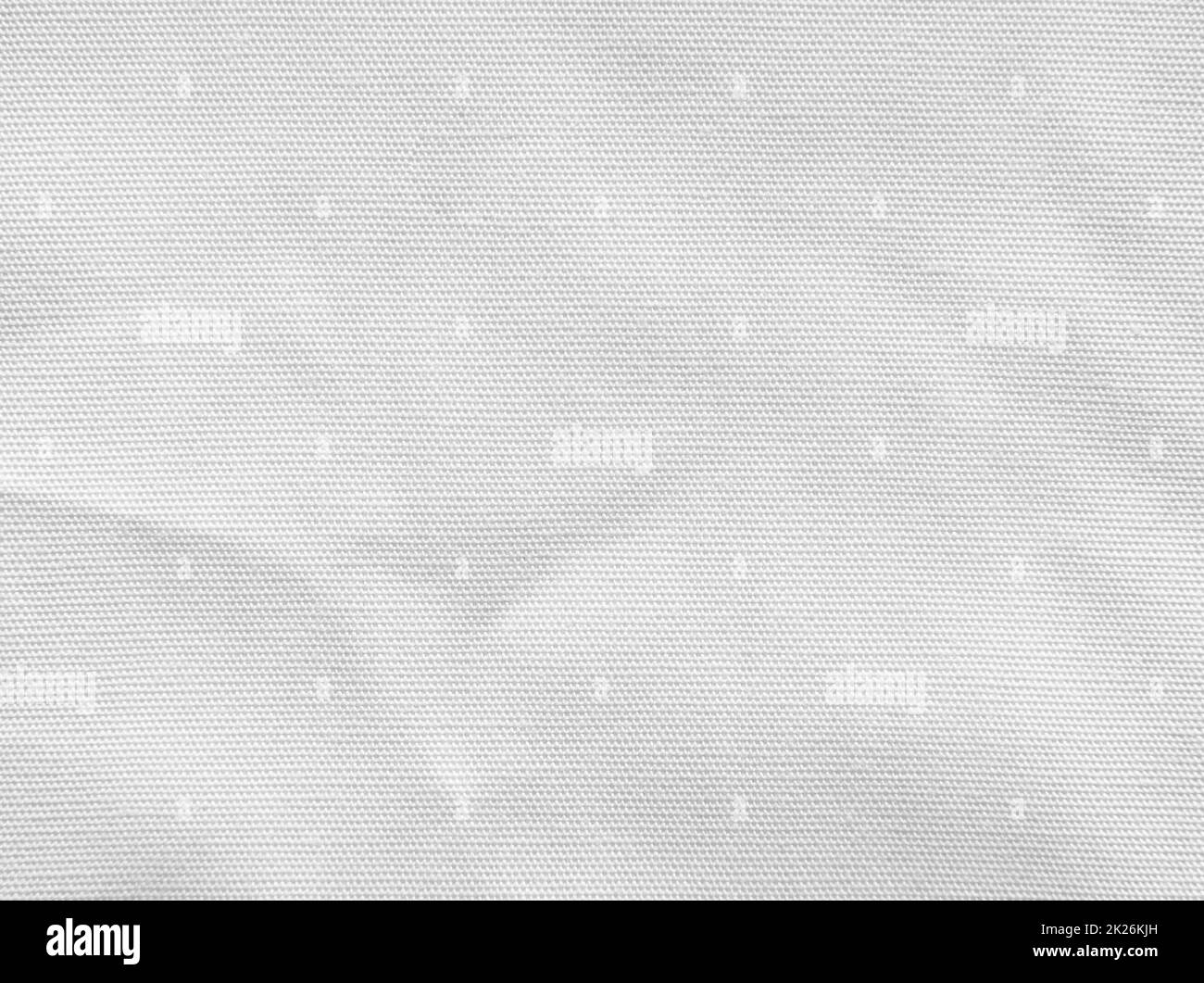 Crumpled white fabric texture background. Stock Photo