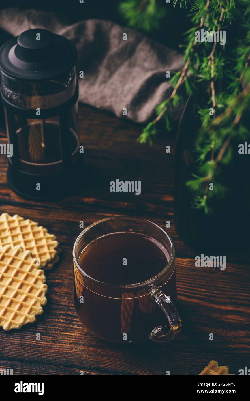 Cup of coffee brewed in french press Stock Photo