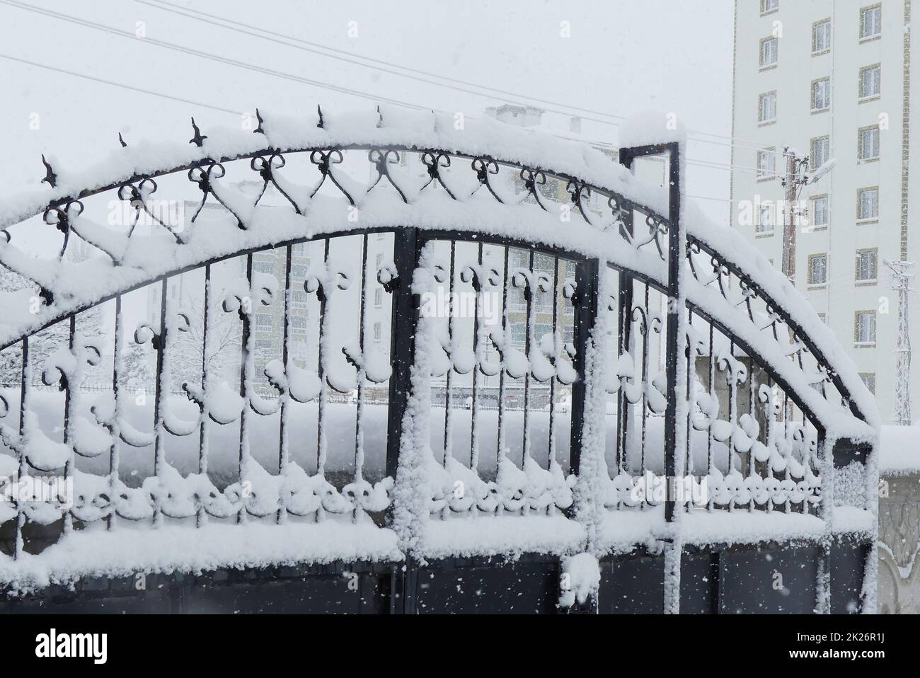 snow landscapes in winter, snow falling on the iron gate, wonderful images created by snow, snow landscapes Stock Photo