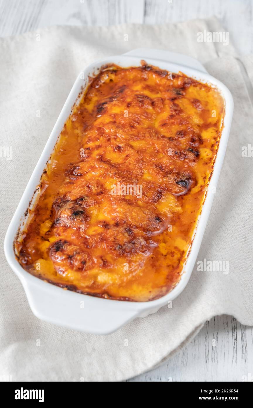 Baked salmon with cheese sauce Stock Photo - Alamy