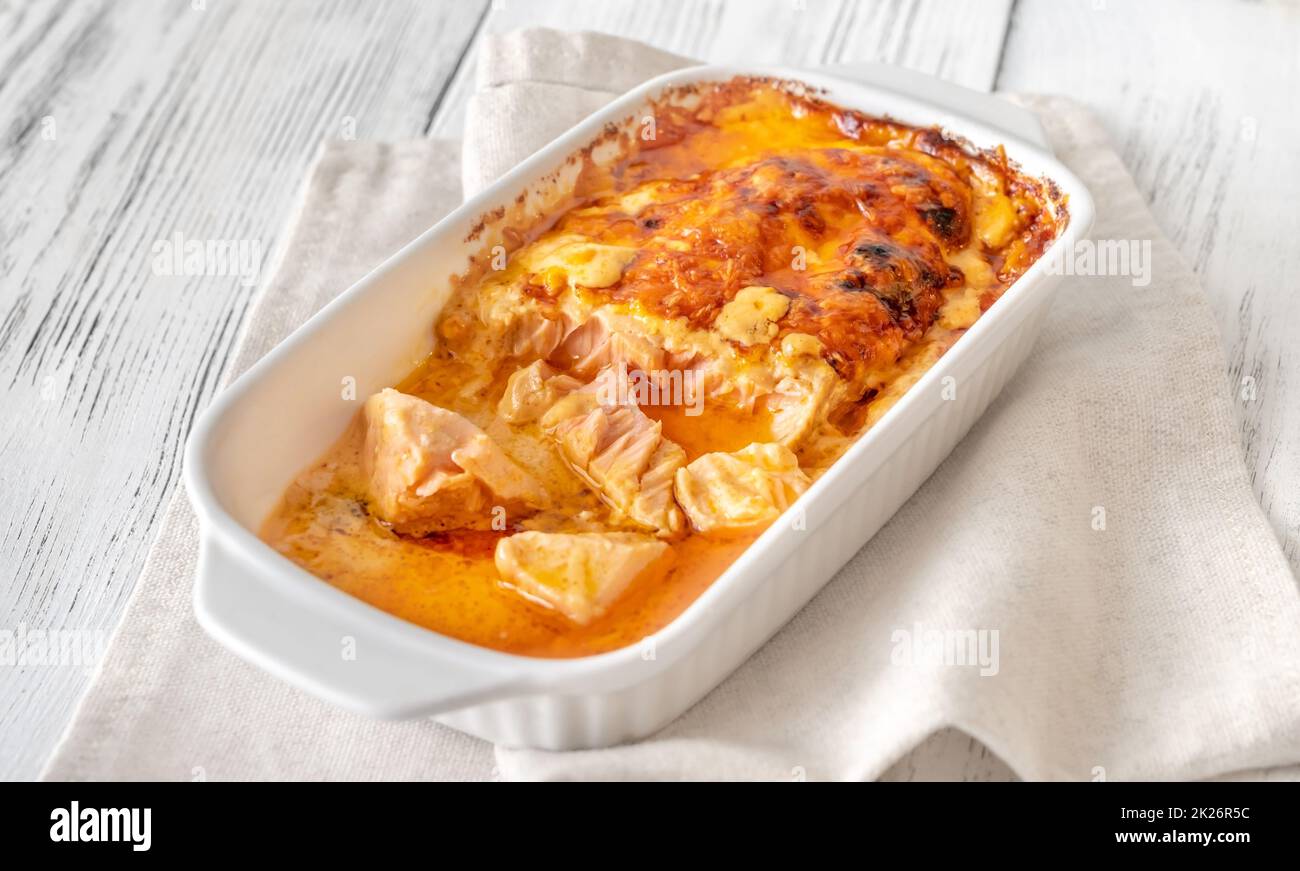 Baked salmon with cheese sauce Stock Photo - Alamy