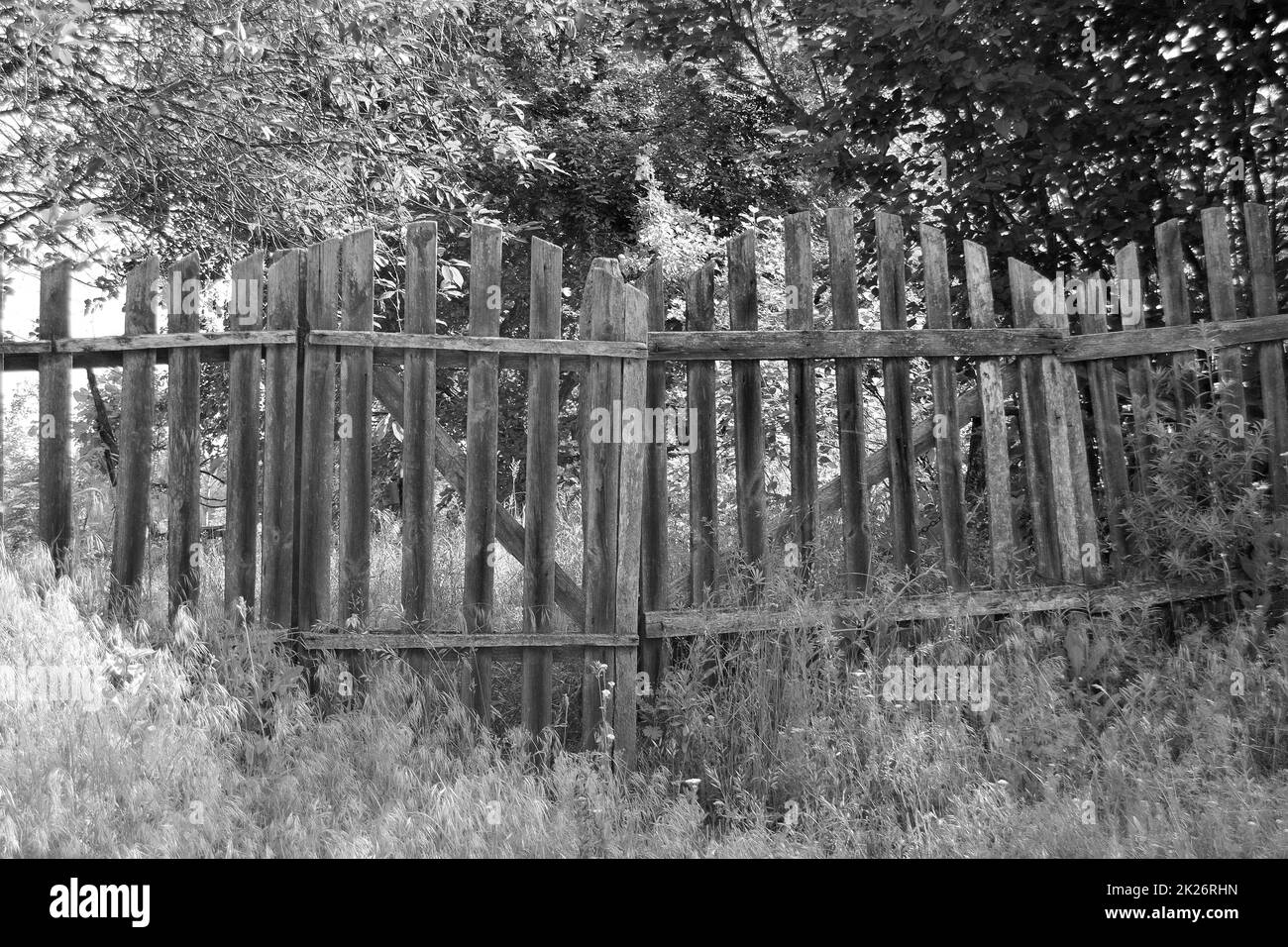 Old house with wooden fence Black and White Stock Photos & Images - Alamy