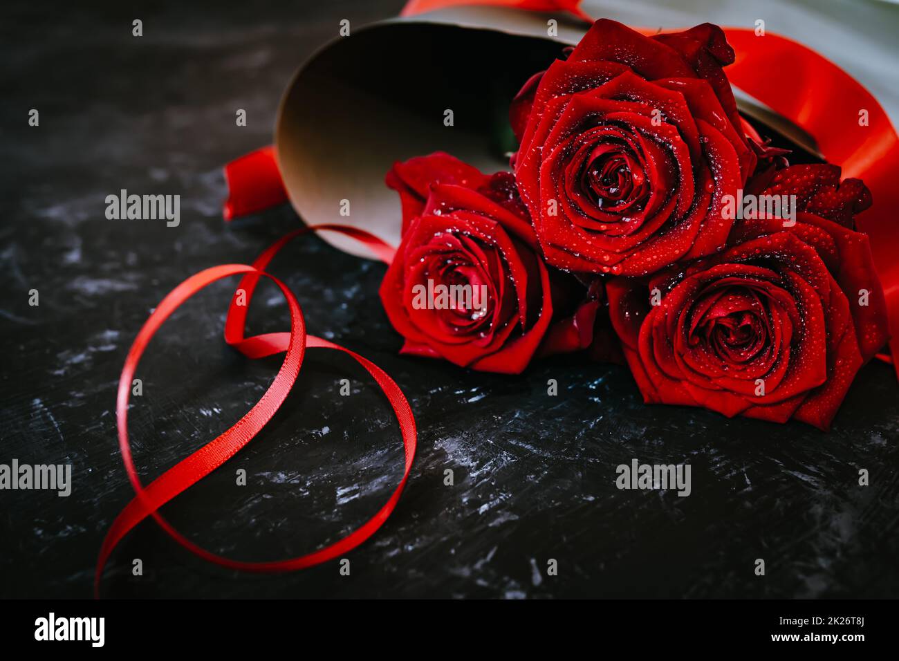 Dark red roses hi-res stock photography and images - Alamy
