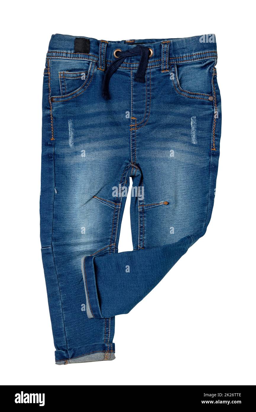 Blue jeans. Closeup of a trendy stylish dark blue denim pants or trousers for boys isolated on a white background. Clipping path. Kids summer and autumn fashion. Front view. Stock Photo