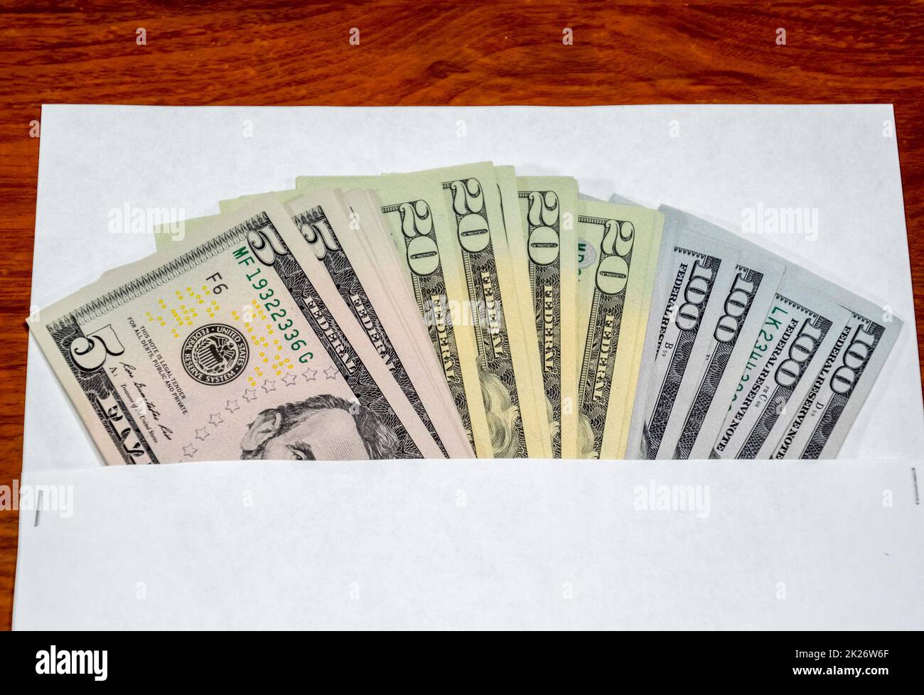 Dollars on table with an envelope. Money in an envelope. U.S. dollars